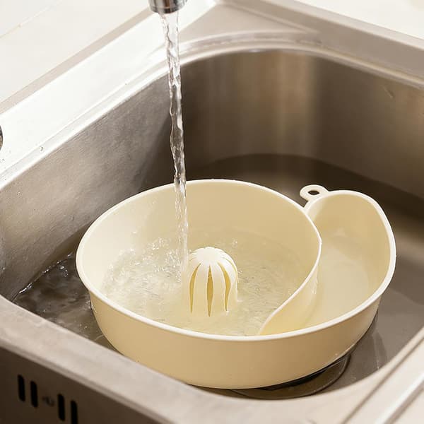 Colander i skallform for frukt og grønnsaker