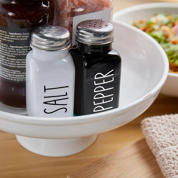 Salt- och pepparkar, svartvitt glas med rostfria stållock i metallställ