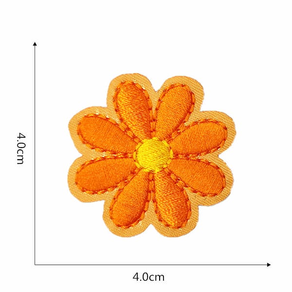 36 stycken blomsterbroderade stryklappar, fjäril, rosor, påstrykningsbara lappar