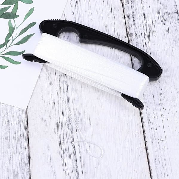 100 m leijulanka kelauslaudalla, nailonlanka, musta
