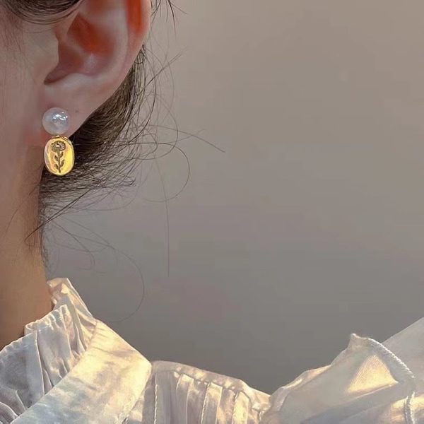 Retro små örhängen kvinnlig design känsla örhängen temperamen