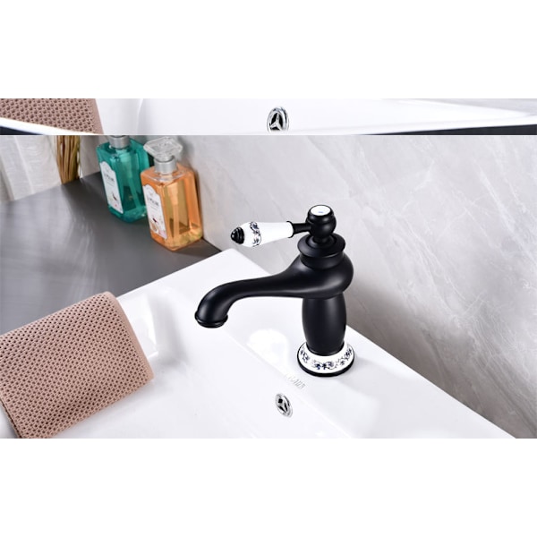 Musta kuuma ja kylmä allashana, retro kylpyhuoneen wc maalaismainen allas