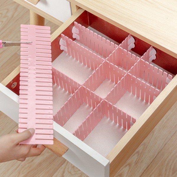Vaaleanpunaiset laatikonjakajat, laatikon ristikkoosaston jakajat, muovia