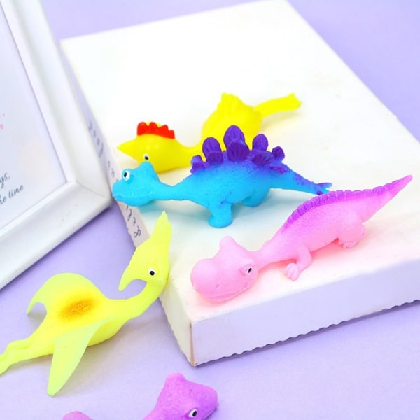Utdragbara flygande dinosaurier (set om 4, blandade färger) - perfekt som en