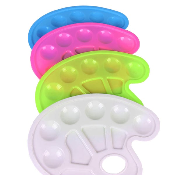 Set med 4 färgade ovala färgbrickor i plast