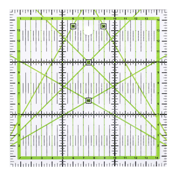 30 x 30 cm:n tilkkutyöviivain, jossa ilmaiset liukuesteet. Läpinäkyvä