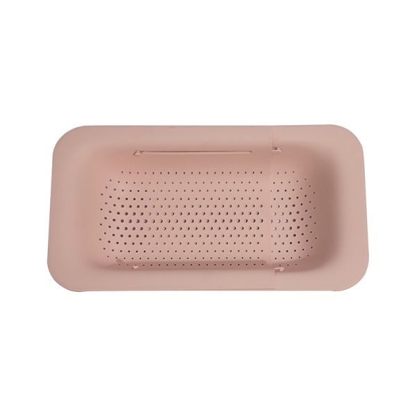 Pink strainer for the sink - cleans vegetables and fruits, drain