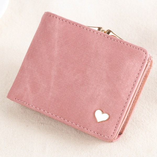 En liten rosa plånbok med hjärtformad prydnad, 9,5 cm × 11,5 cm ×