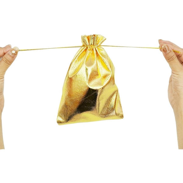 (13 cm x 18 cm) 100 kpl kultaisia ​​kiristysnyörillä varustettuja lahjapusseja, pieniä lahjapusseja J
