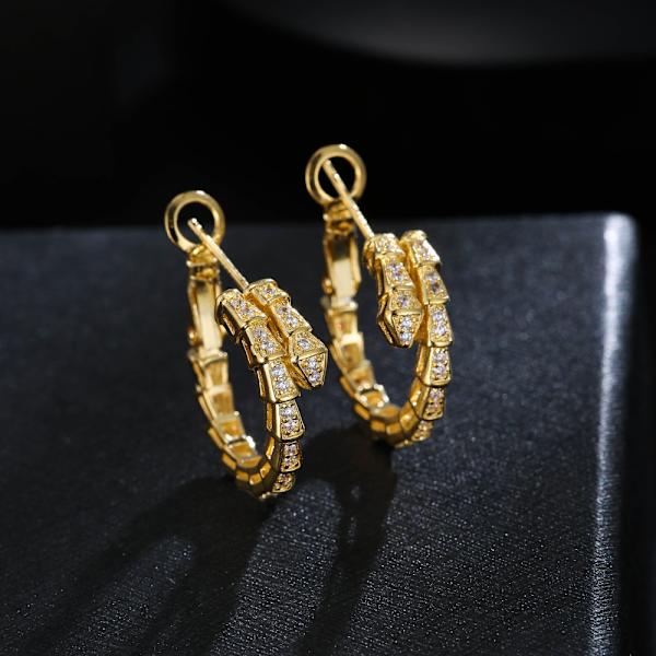 Europæisk og amerikansk øre serpentine zircon metal vind desig