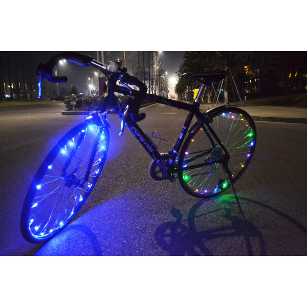 Blå pakke med 1 dæk LED-cykelhjulslygter bliver lysere og mere synlige