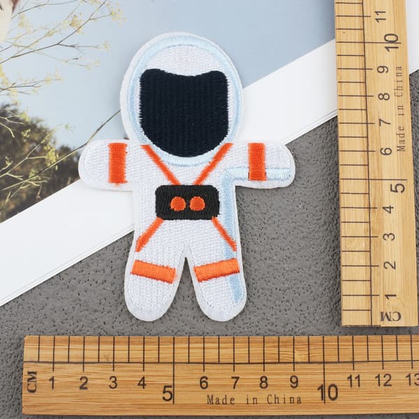27 stycken datorbroderade standard astronautbroderier c