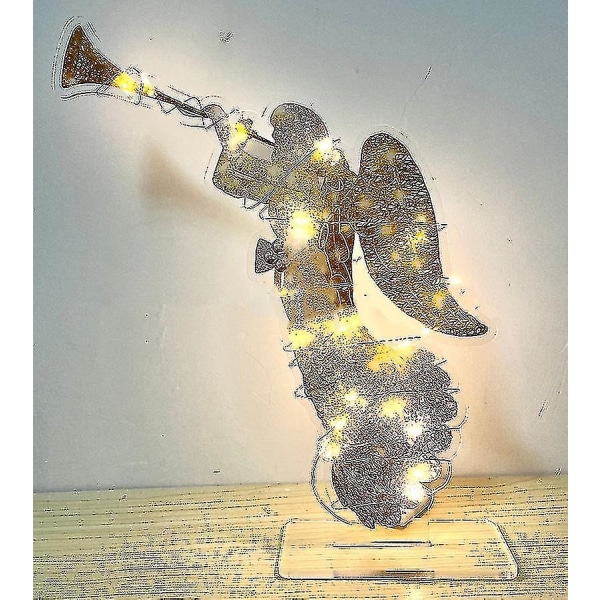 Lys opp engel med trompetfestlig dekorasjon, ledet utendørs