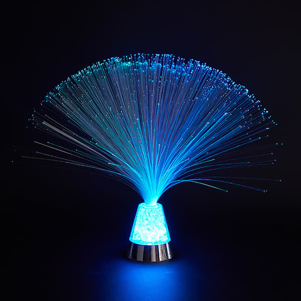 Farverig lysende base optisk fiber lampe med stjerner overalt