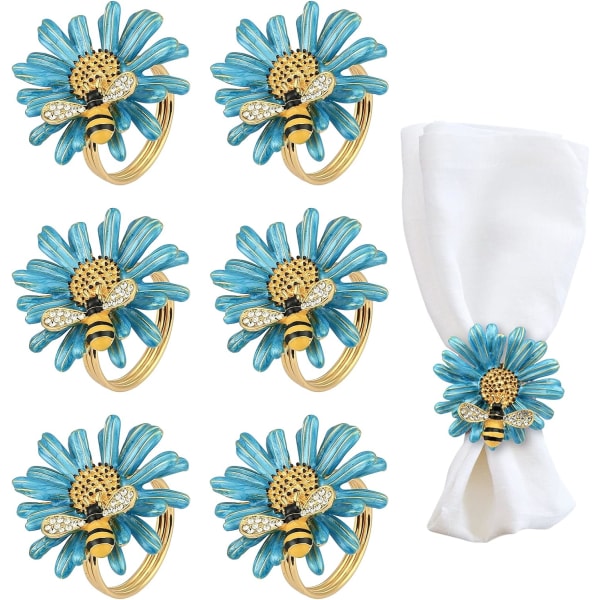 Set med 6 servettringar av Daisy and Bee, guld och blå, metallservett