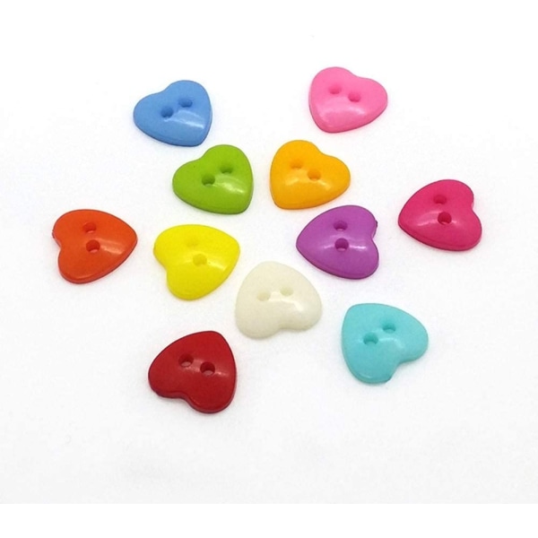 100 stk harpiks hjerteformede 2-huls knapper til syning (tilfældig farve