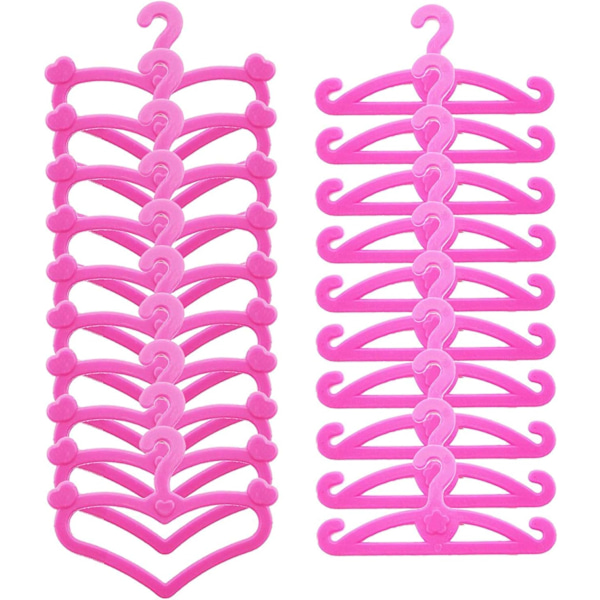 40 rosa plastgalgar för Barbiekläder 11,5 tum