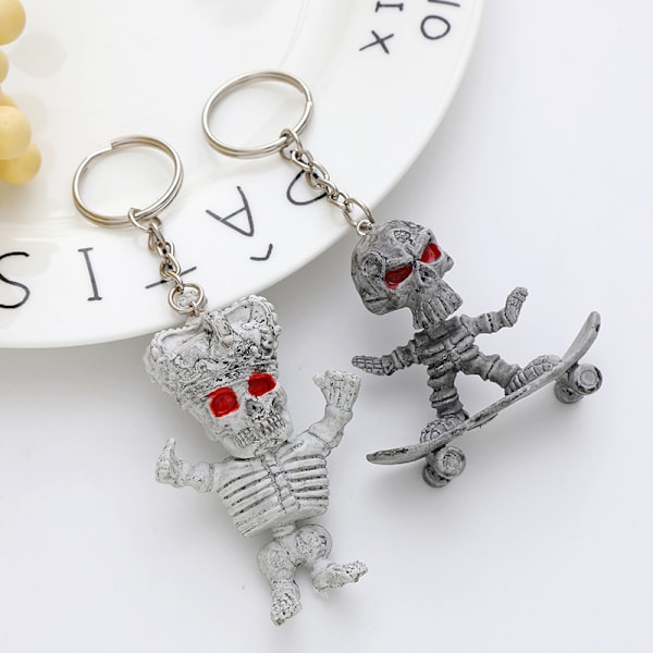 Skull Keychain Pendant Halloween Siddende WC Spøgelse Nøglering Spøgelse