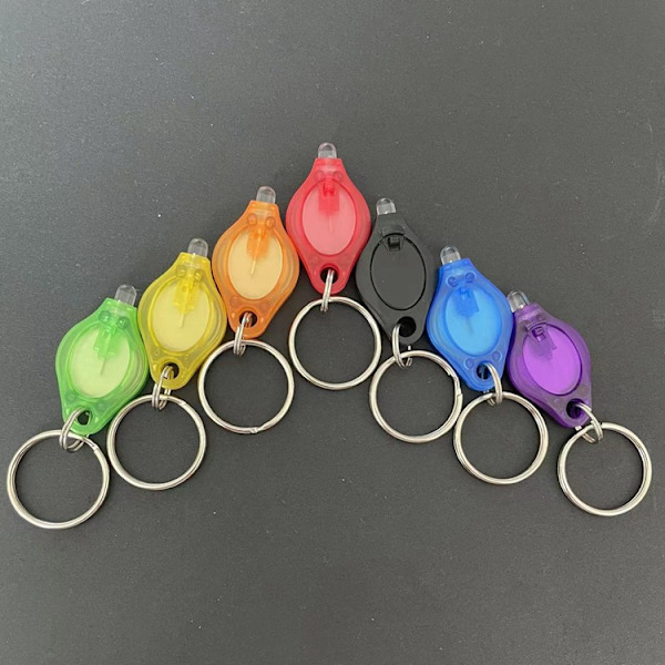 4 kpl (valkoinen+violetti+sininen+musta) Mini LED-avainperä kannettava Ultra