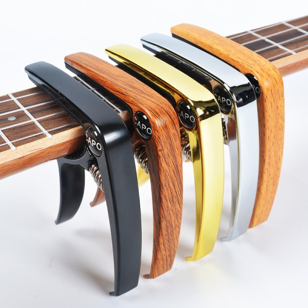 1 st svart gitarr capo, gitarr capo med 6 unika mediatorer f
