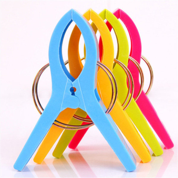 Pakke med 4 store Bright Color Plastic Beach Towel Pegs Clips for