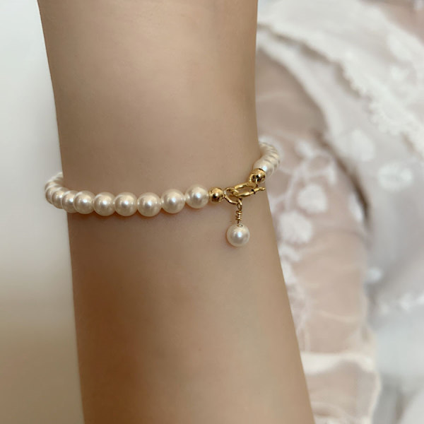 Pärlarmband från Shiguang, 14K guld inlindat
