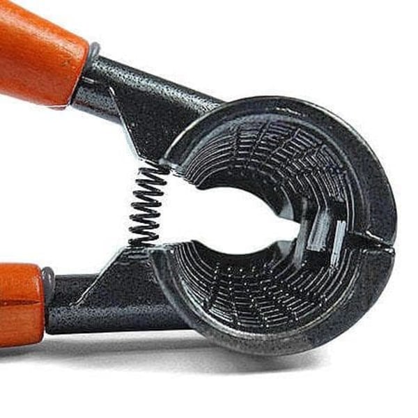 2-in-1 Nutcracker / Bottle Opener - Crack Nuts & Open Bottles