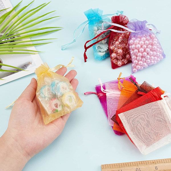 Smyckespåsar, genomskinliga presentpåsar i organza för bröllopsgåvor, festdekoration, enkla att använda, färgglada (50 st), med dragskodesign