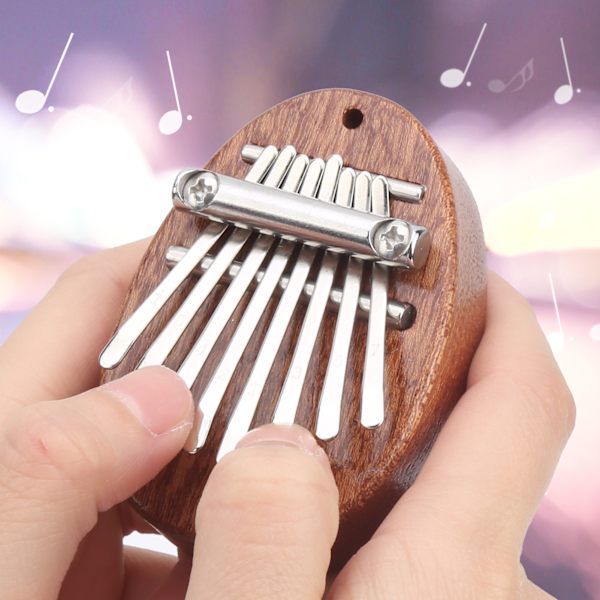 Miniatyr tummepiano söt bärbar fingerkalimba med 8 tangenter för barn vänner på semester