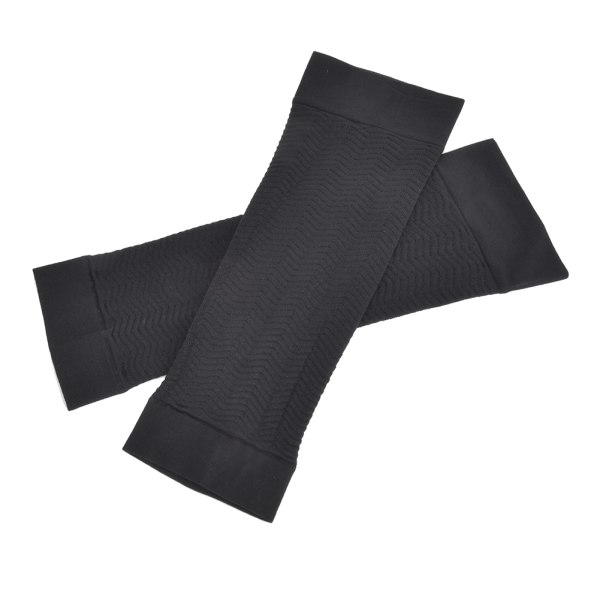 Et par med svarte pustende nylon svettabsorberende slanke armformere for sport løping yoga