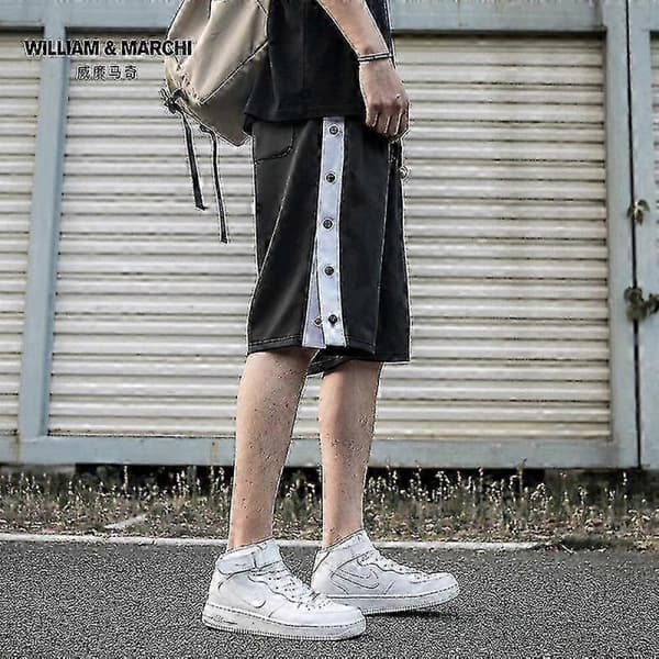 Basketshorts för män med sidosnap och avrivningsdesign