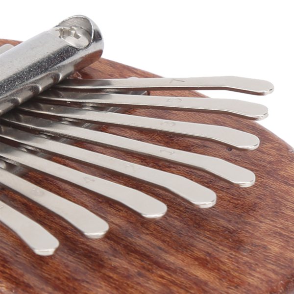 Miniatyr tummepiano söt bärbar fingerkalimba med 8 tangenter för barn vänner på semester
