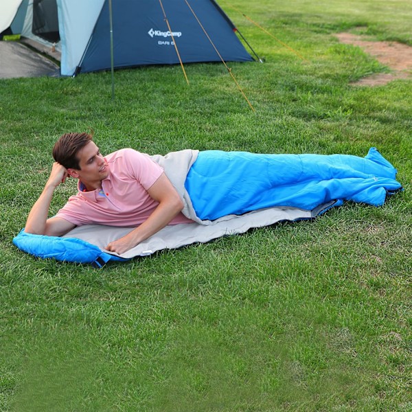 Sovsäck med hålfiberfyllning, vattentätt yttre lager ger skydd och komfort för barn och vuxna vid camping och resor