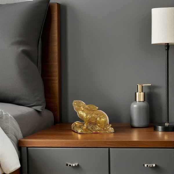 Liten messingkaninskulptur for dekor som symboliserer lykke