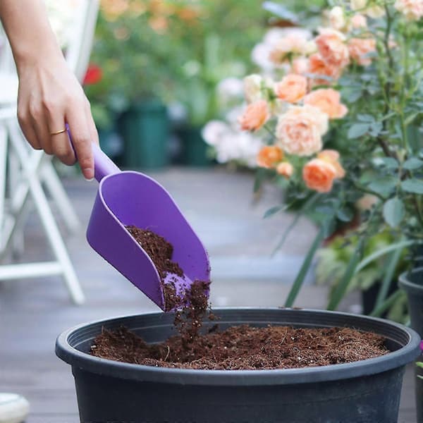 Trädgårdsspade i plast, handspade, murslev