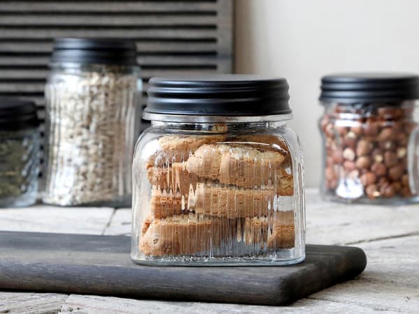 Glass jar with black lid