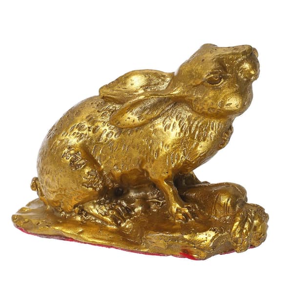 Liten messingkaninskulptur for dekor som symboliserer lykke