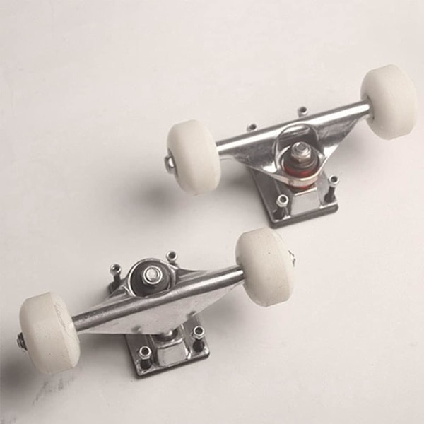 2 sæt skateboardhjul, aluminiumslegering, skateboardtrucks, gummi, firehjulede longboarddele, cruiser, sølv