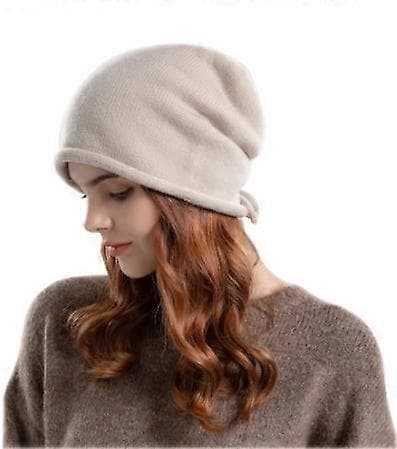1 stk. beige stabelbar hue, tynd model til efterår og vinter, justering med snøre, hueomkreds 55-60 cm