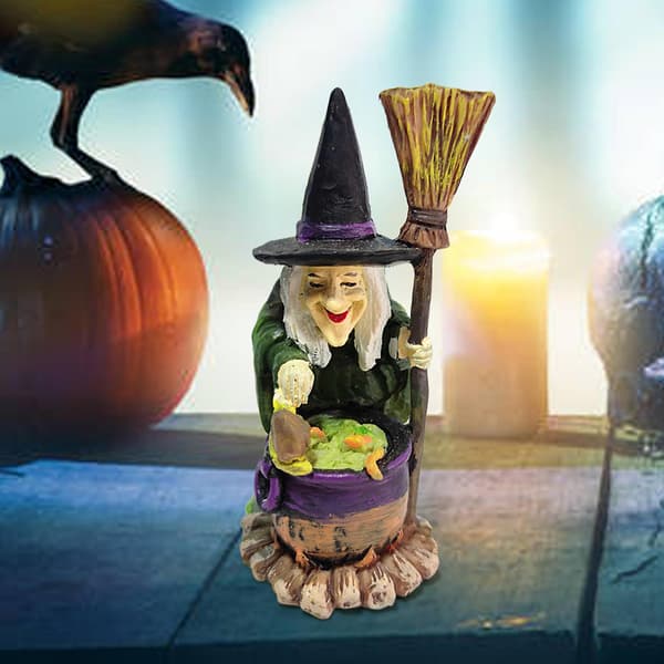 Figurer av trollmann og heks for Halloween-dekorasjon
