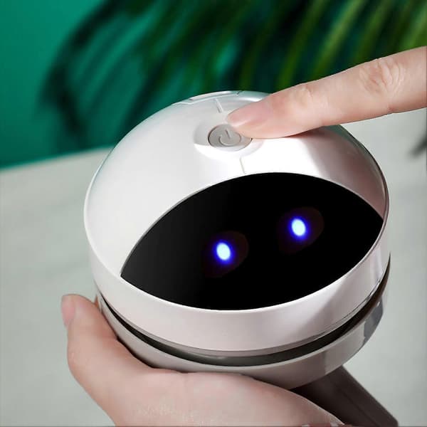 Innovativ kompakt och tyst minidammsugare
