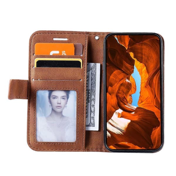 For iPhone 15 Mobildeksel Hudvennlig Delt Design Skinn Mobildeksel med Håndstropp