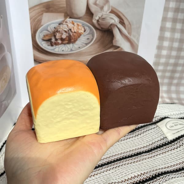 Smør Langsomt Stigende Squishy, Squishy Legetøj, Dumpling Stressbolde, Fidget Legetøj (Sort Gul Hawaiian Roll squishy) Black Yellow Hawaiian Roll squishy
