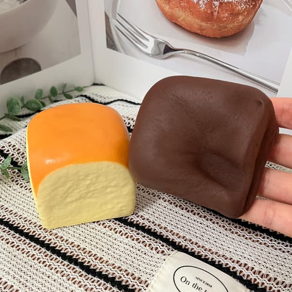 Smør Langsomt Stigende Squishy, Squishy Legetøj, Dumpling Stressbolde, Fidget Legetøj (Sort Gul Hawaiian Roll squishy) Black Yellow Hawaiian Roll squishy