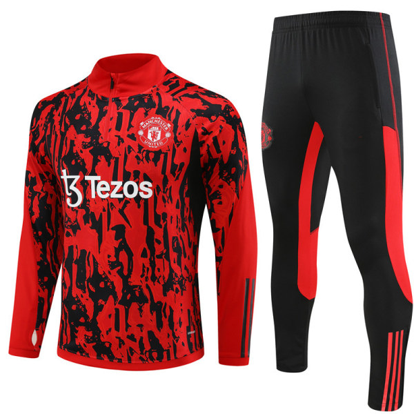 23-24 Nya Manchester United långärmade halvdragningsträningskläder för vuxna och barn set camouflage 14