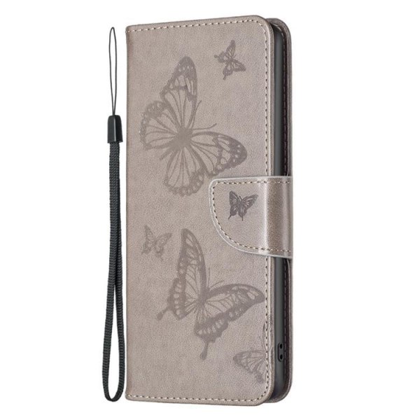 iPhone 14 Pro Plånboksfodral Butterflies Imprinted - Grå