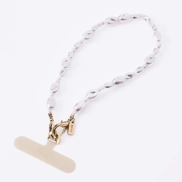 UNIQ Coehl Perla Handstrap Mobilrem Universal – Vit
