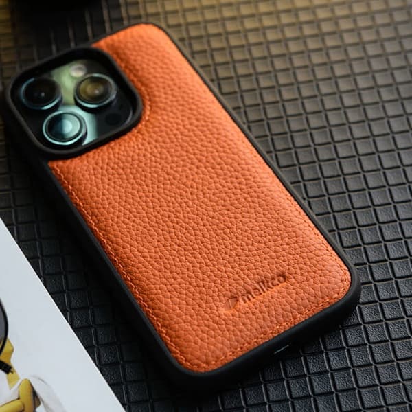 MELKCO Mobilskal till iPhone 15 Pro Max Äkta Läder Belagt PC - Orange