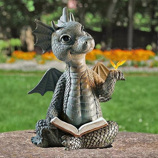 Drage som leser bok-statue Dinosaur som holder sommerfugl-figurer A