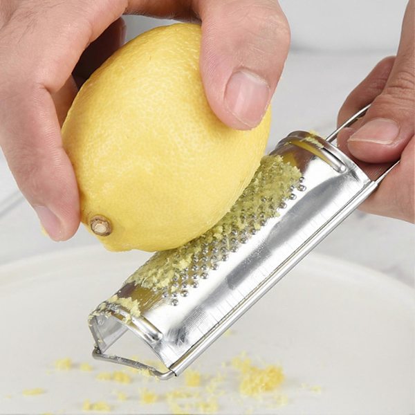 Multifunksjonell nøtterive i rustfritt stål melon ingefærrive ergonomisk håndtak hvitløksrive husholdningsutstyr